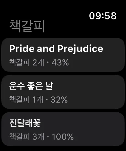 Apple Watch listing bookmarks for three books, with the number of bookmarks and progress